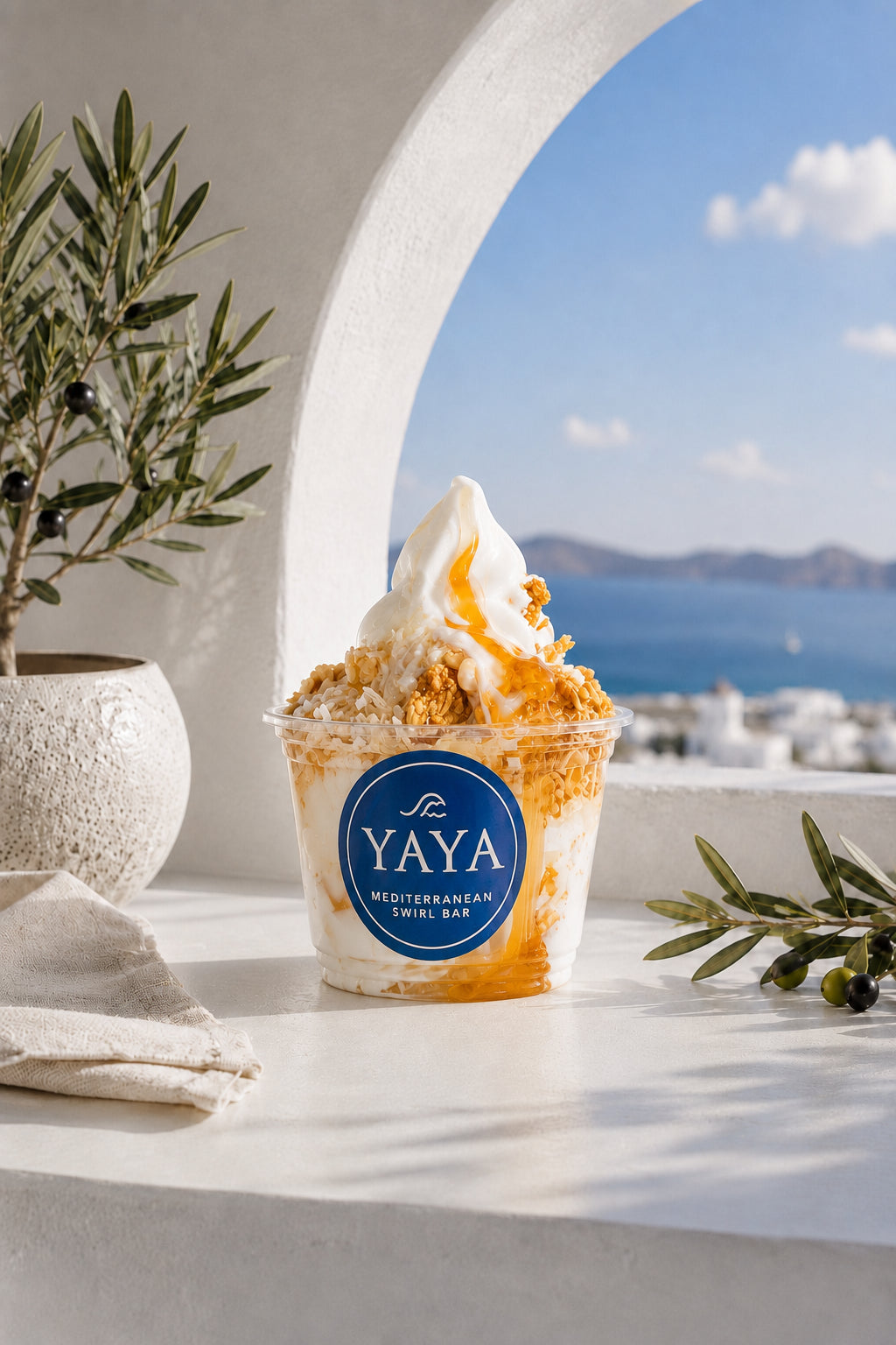 YAYA frozen Greek yogurt in a Mediterranean setting
